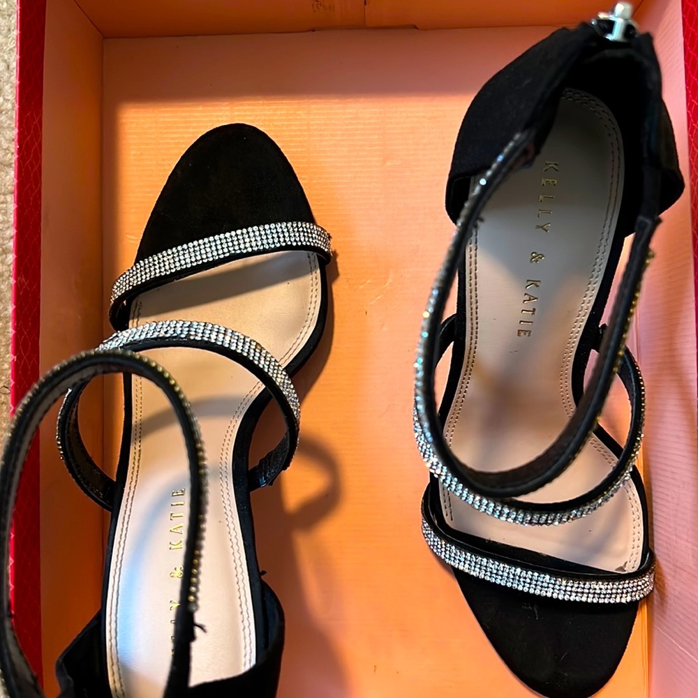 Women’s evening black dress heel. Rhinestone straps worn once.Some imperfection.